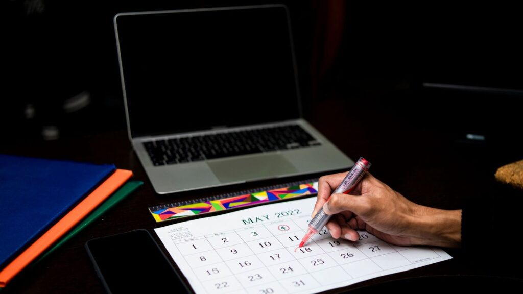 Calendar with dates marked for follow-up HIV tests after a needle-stick injury