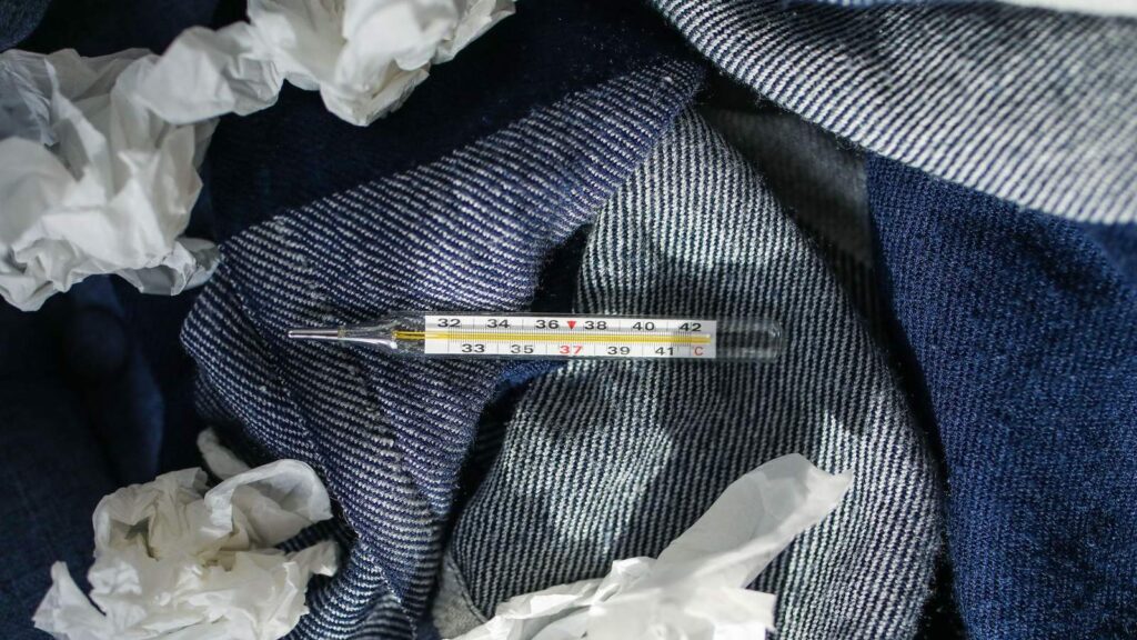 Digital thermometer and tissues; a fever alone cannot show whether HIV is present