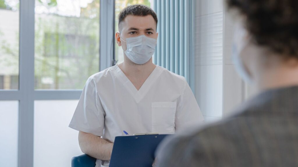Doctor explaining what a negative HIV test result means at a follow-up visit
