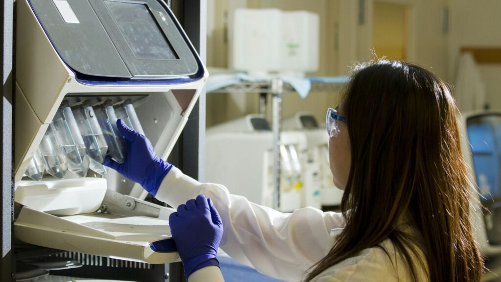 Laboratory technician processing samples for the HIV test and kidney check before PrEP