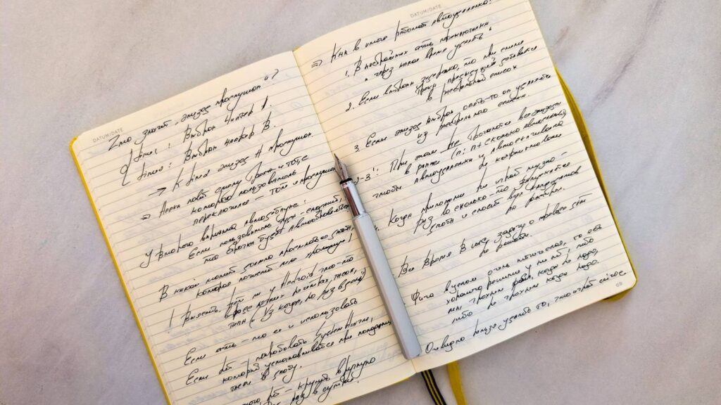 Notebook with handwritten notes, useful for recording symptom dates for a doctor
