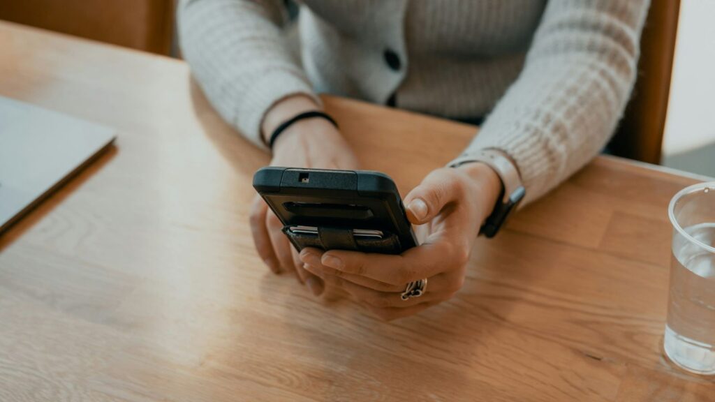 Person adding a PrEP check-up reminder to a phone calendar