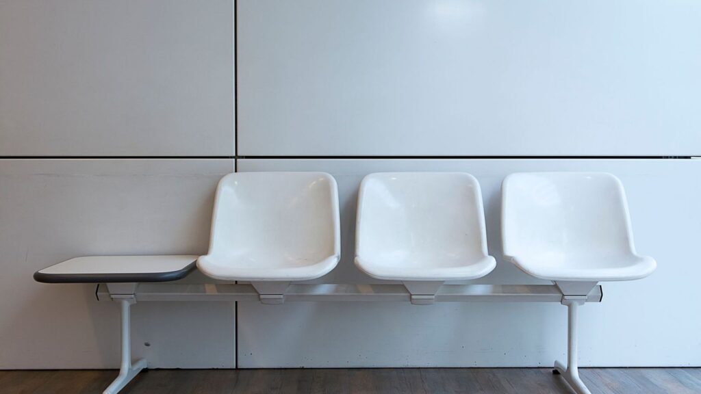 Quiet clinic waiting area while a rapid test result is prepared