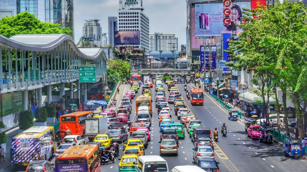 Busy Bangkok street under the BTS Skytrain, near a clinic for follow-up tests and PrEP after PEP