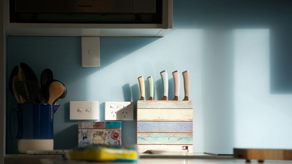 Weekly pill organiser on a kitchen counter, a simple way to keep PEP doses on track